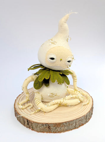 Hannakin - 'Radish Dicapitae' - wool felt, thread, magnet, glass beads and mixed media on raw pine wood base