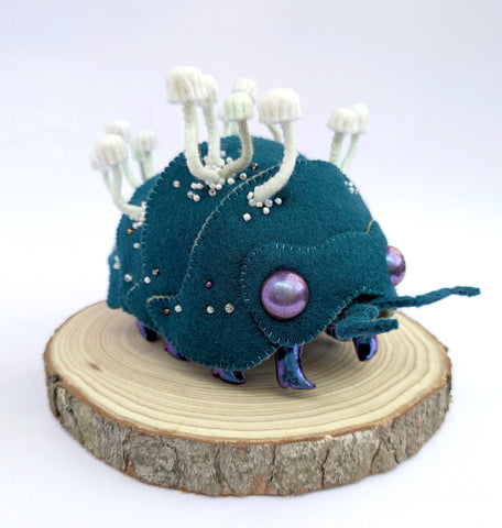 Hannakin - 'Subterranean Isopod' - wool felt, thread, glass beads, Sculpey, wire and mixed media on raw pine wood base