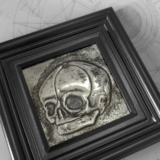 A Curious Elixir - 'Fetus Skull' - hand embossed repoussé metal wall art